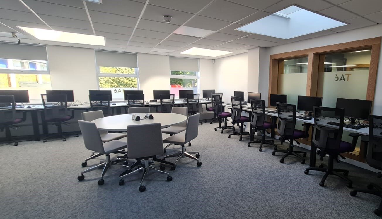 CIF-funded school IT suite refurbishment with modern computers, ergonomic seating, and improved learning facilities.