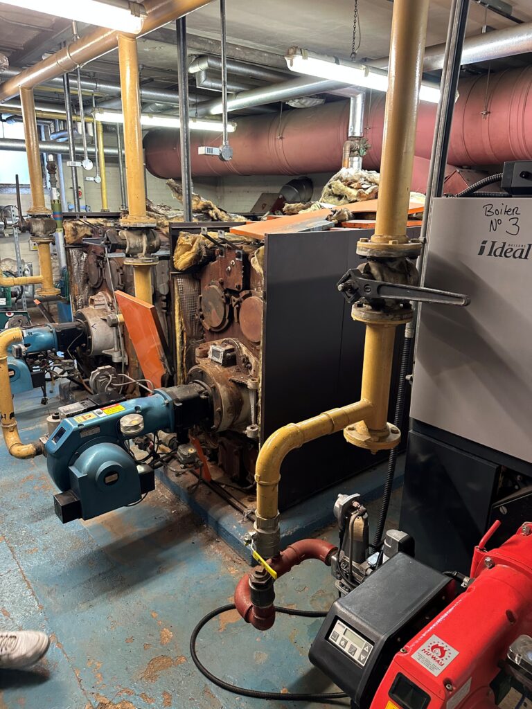 Old and deteriorating school boiler system requiring urgent replacement through Urgent Capital Support funding.