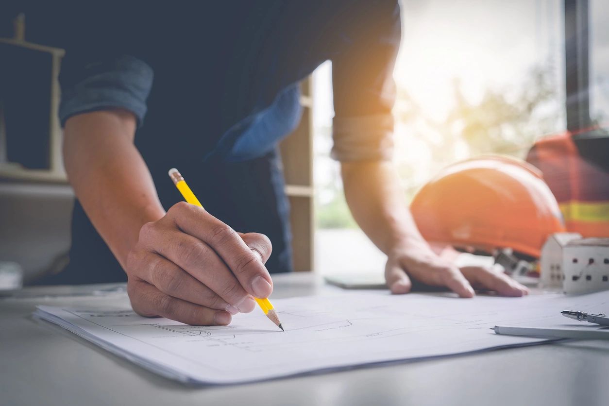 Education building surveyor preparing CIF funding project drawings for school refurbishment