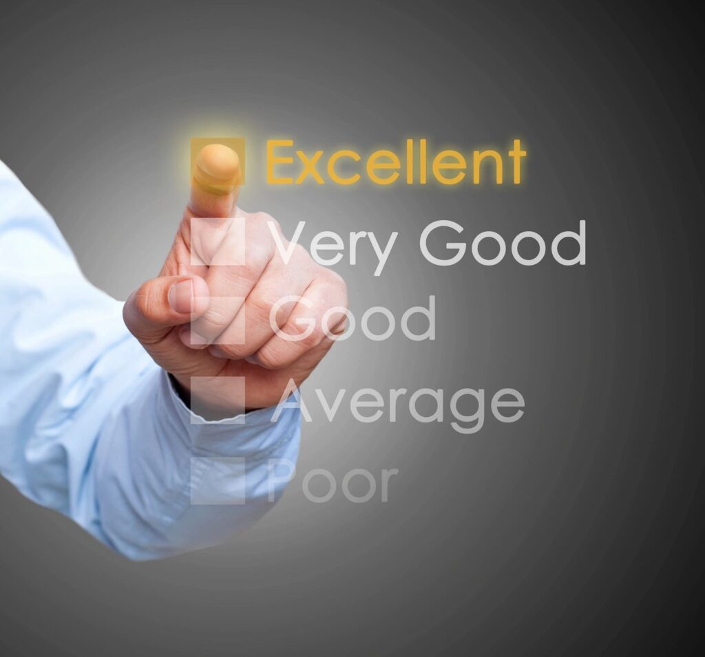 Customer satisfaction rating concept with a hand selecting 'Excellent' from a quality feedback scale.