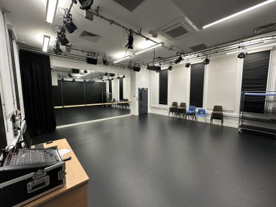 Drama studio with stage lighting, mirrors and sound system