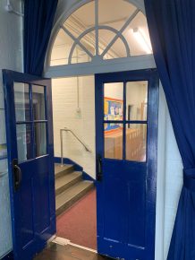Old school entrance doors highlighted in CIF refurbishment case study.