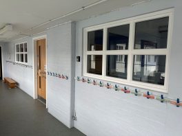CIF-funded school refurbishment with new compliant fire doors and upgraded corridor facilities.
