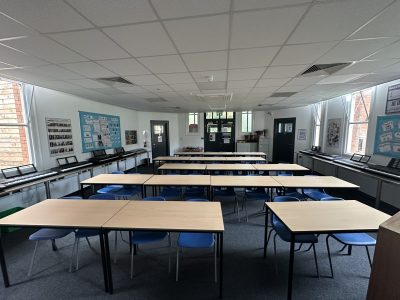 Refurbished classroom with new ceiling, desks and improved lighting