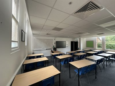 Secondary school classroom with new desks, chairs and AV technology