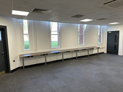 Dedicated music classroom at Fort Pitt Grammar School designed for group practice with extended worktop space and new carpet flooring.